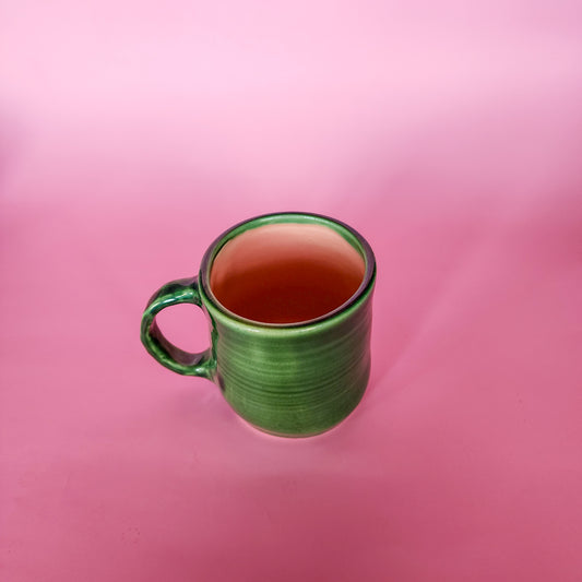 Ponamu with pink mug