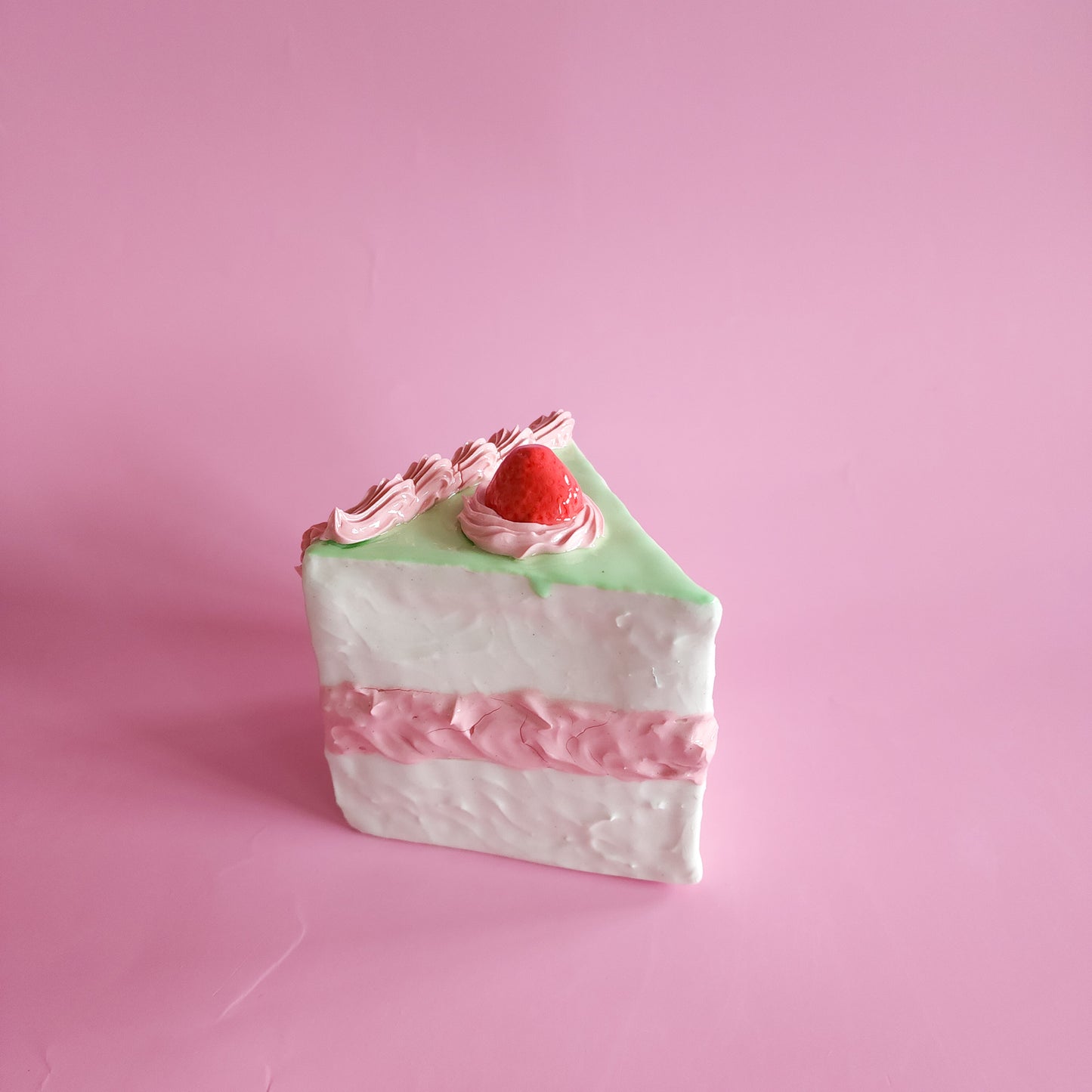 Cake slice sculpture - Matcha and strawberry buttercream icing