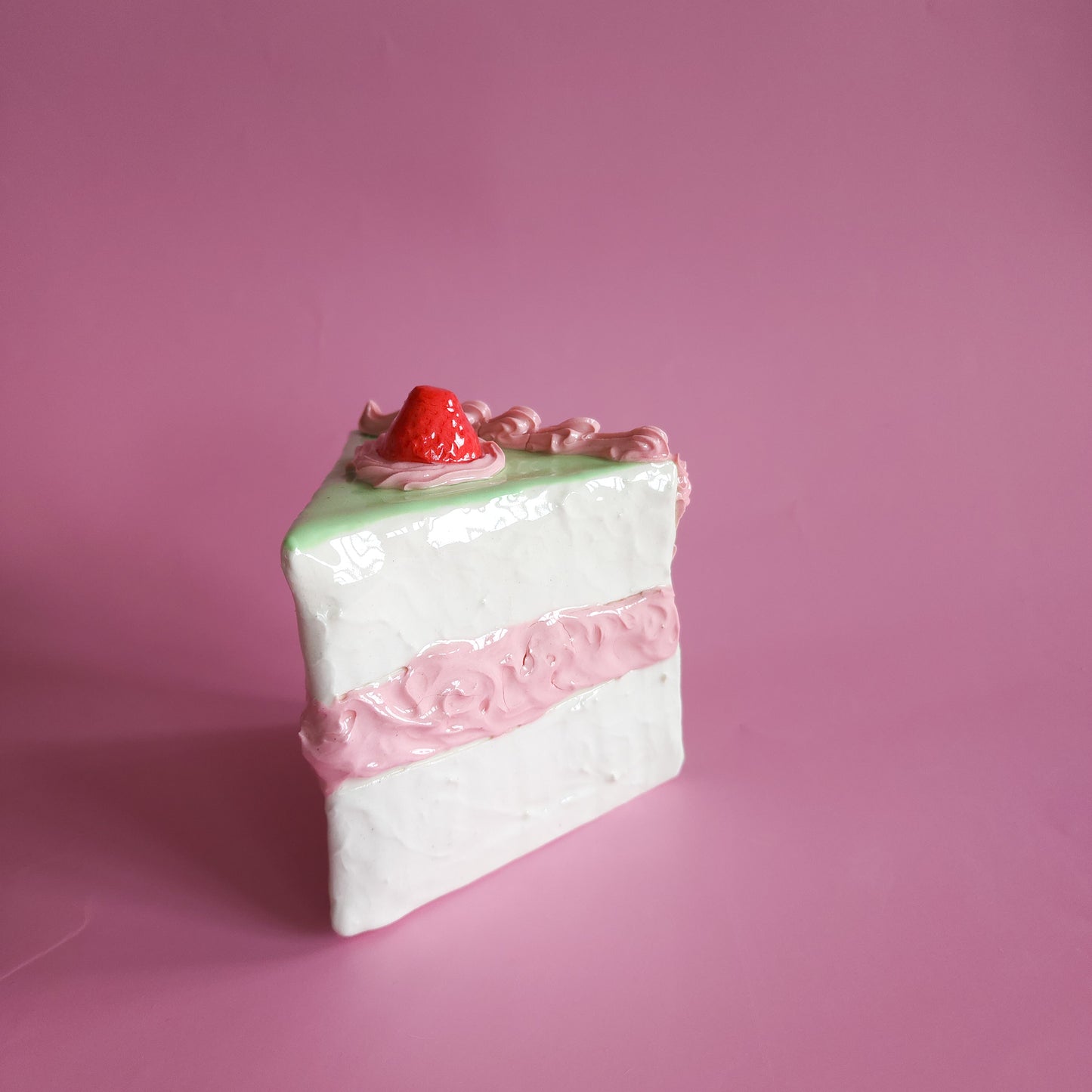 Cake slice sculpture - Matcha and strawberry buttercream icing