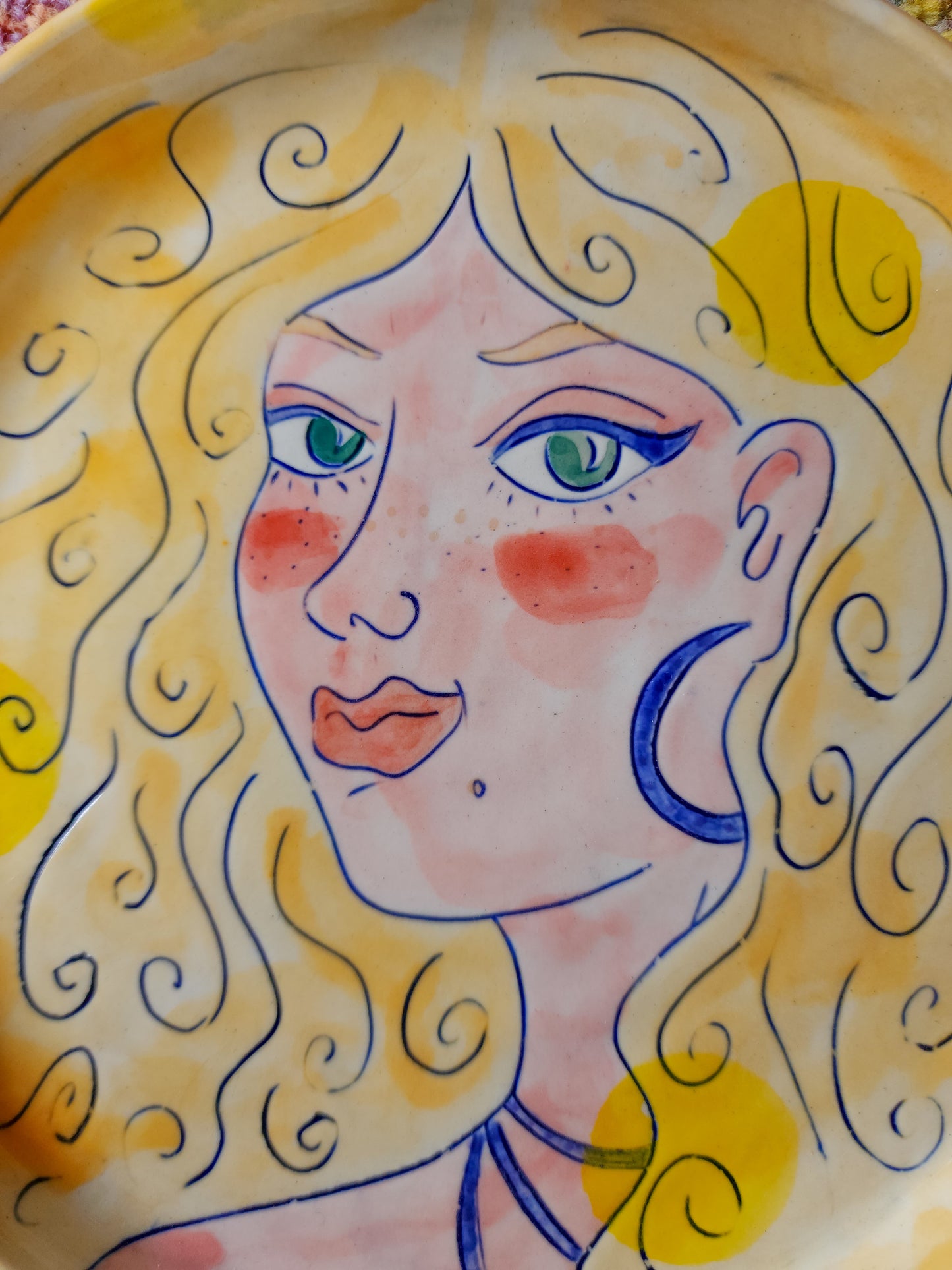 Small pottery face plate