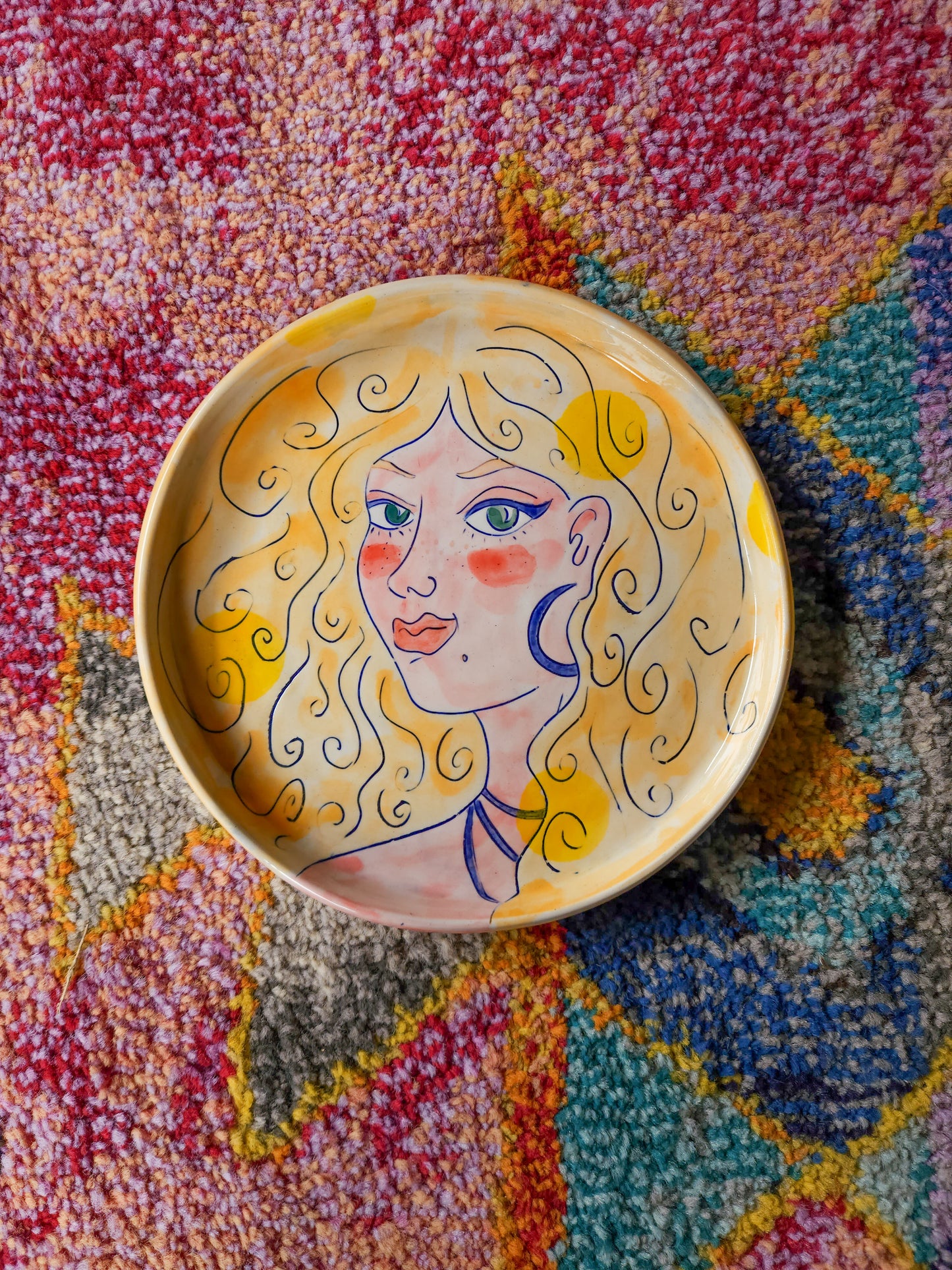Small pottery face plate