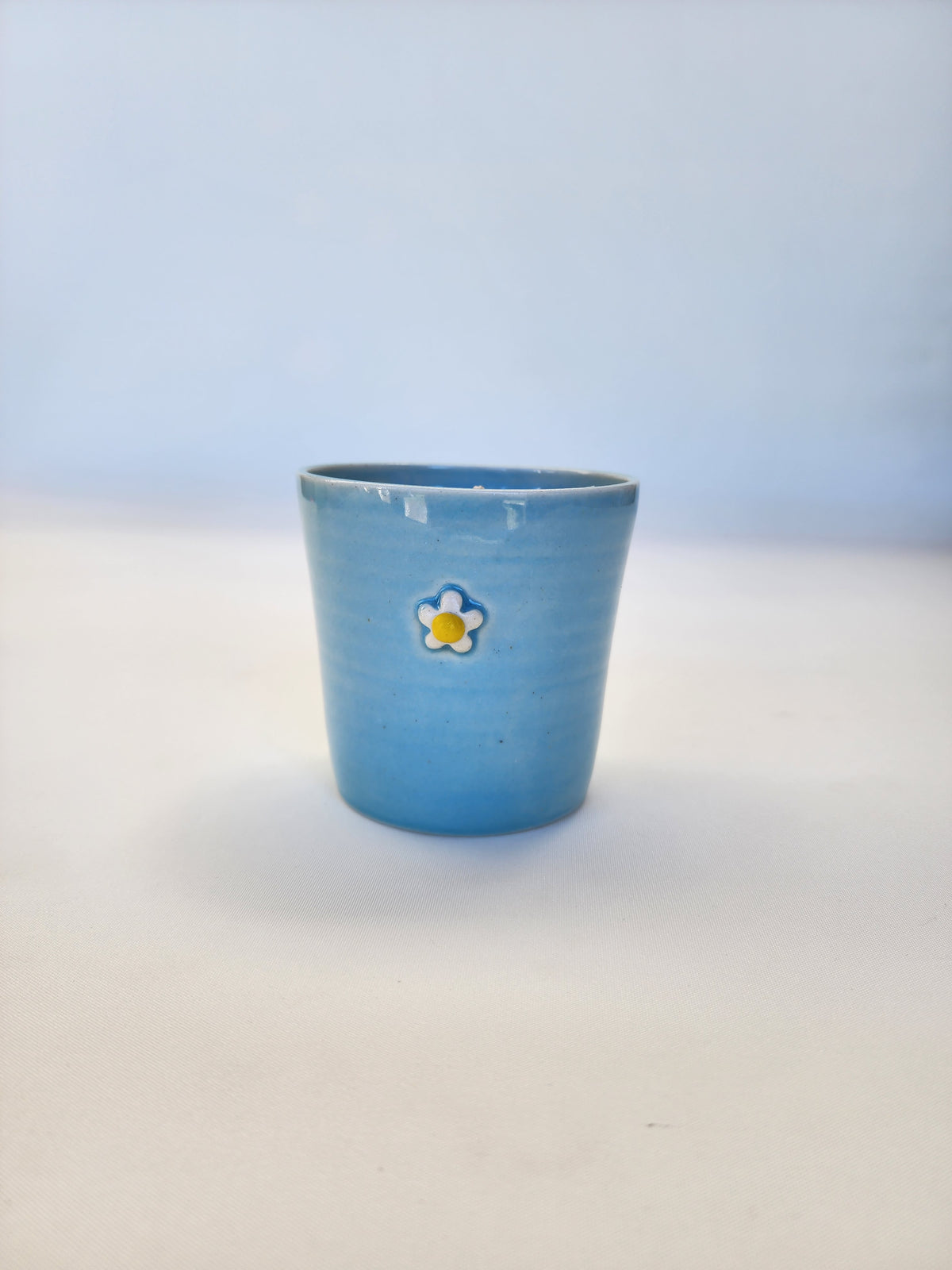 Daisy tumbler with beeswax candle