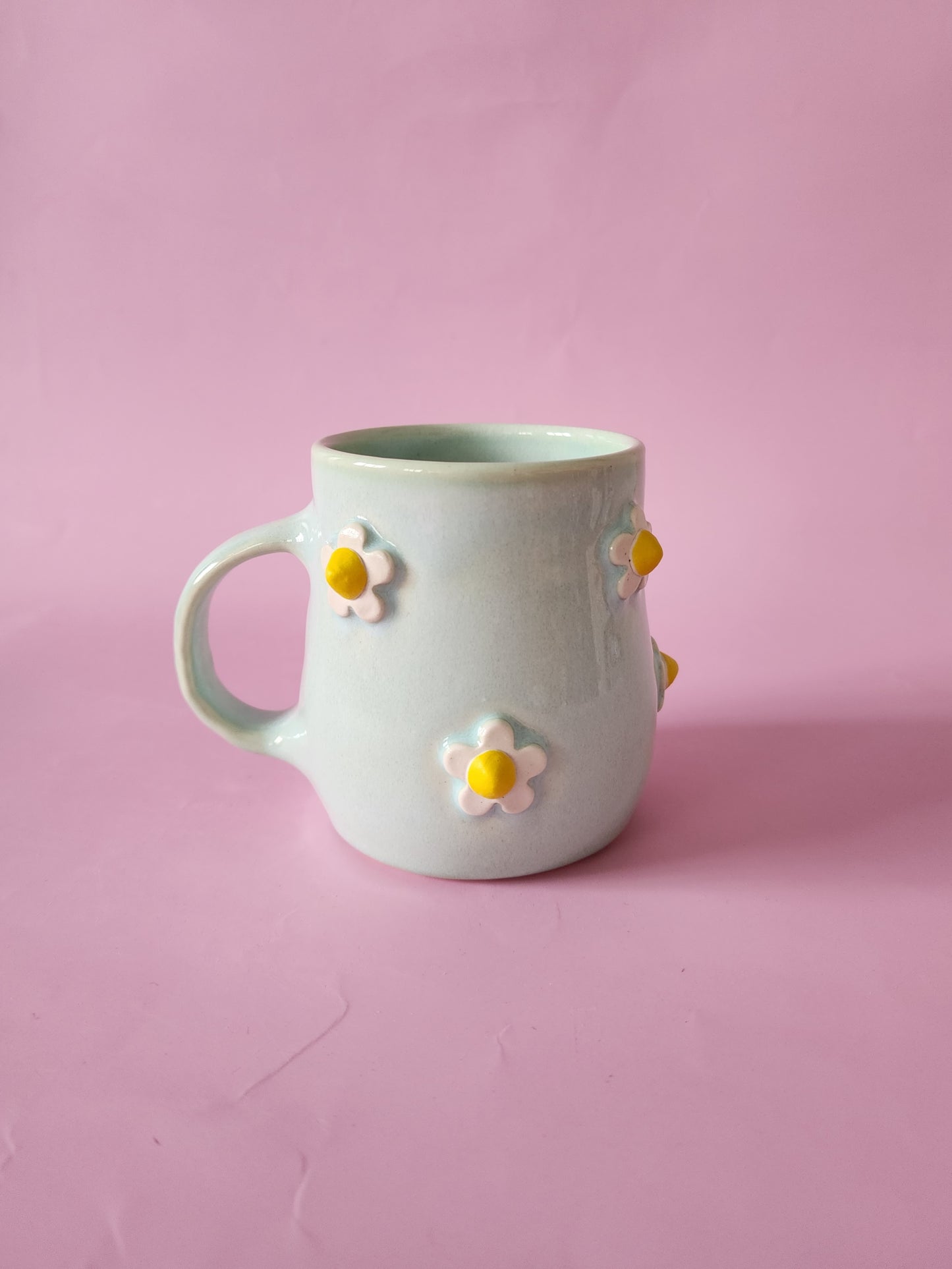Mint green daisy mug