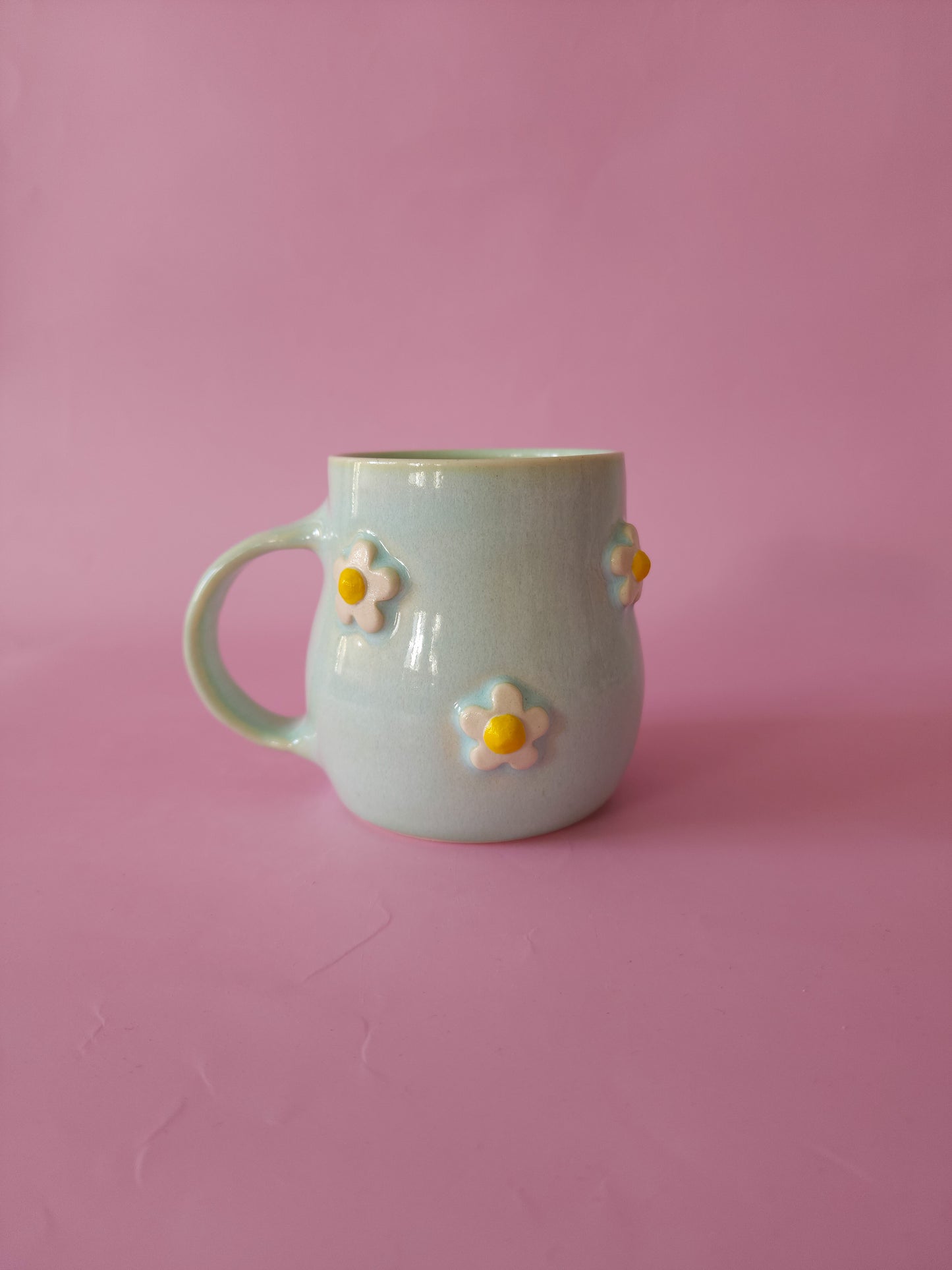 Mint green daisy mug