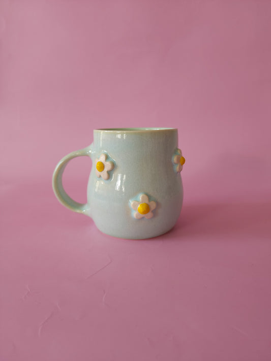Mint green daisy mug