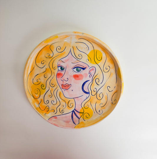 Small pottery face plate