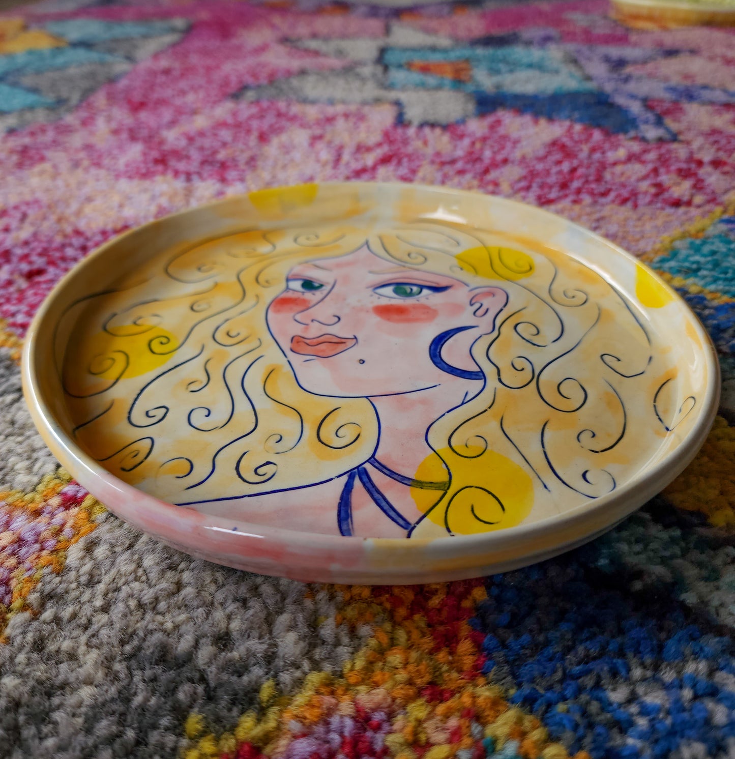 Small pottery face plate